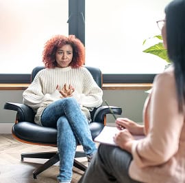 A sad woman in counselling